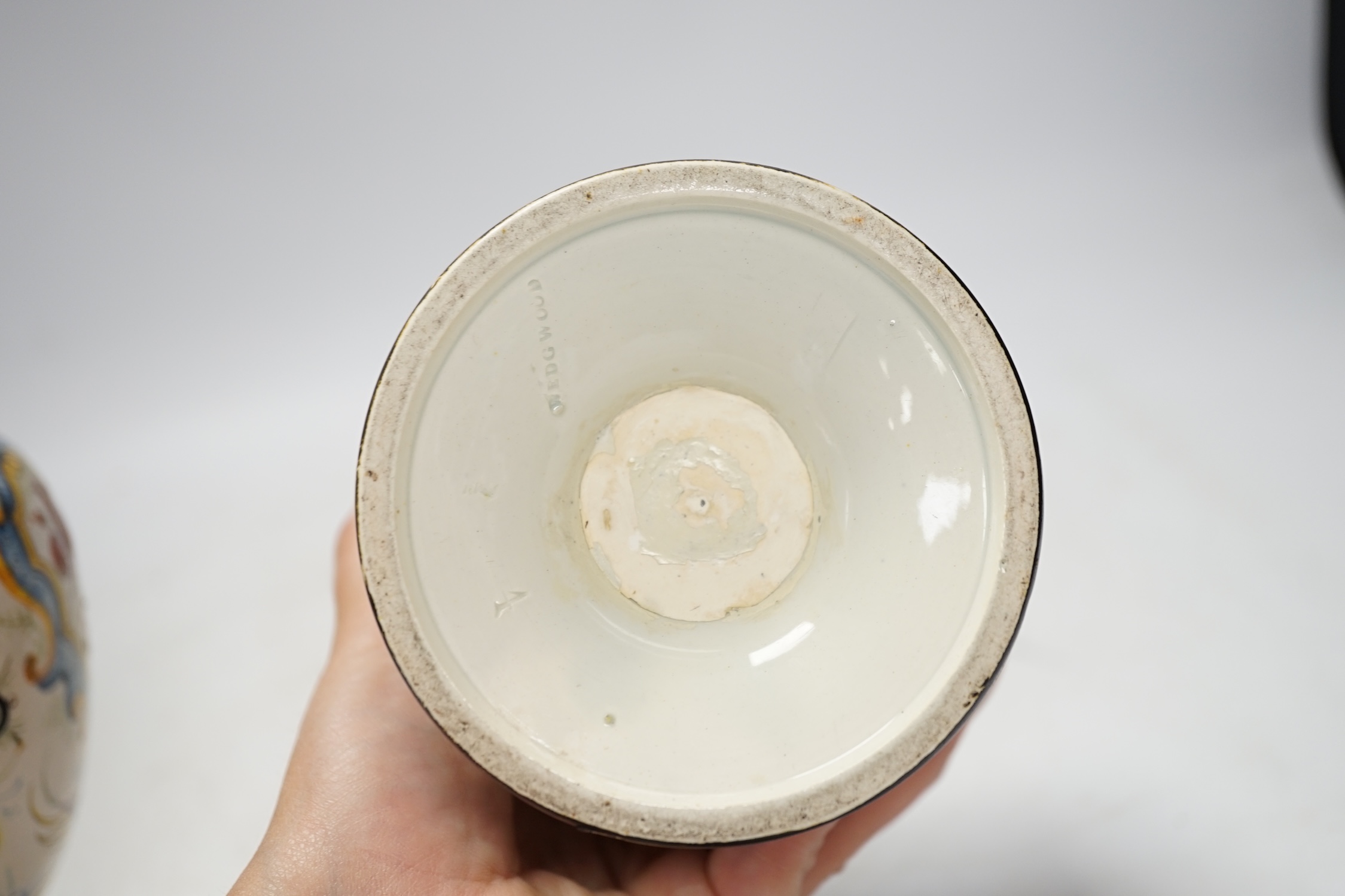 A Wedgwood pot and faience glazed jug and a Cantagalli maiolica pearl glazed jug, 26cm. Condition - poor, losses to upper rim of Cantagalli jug and restoration to base of Wedgwood